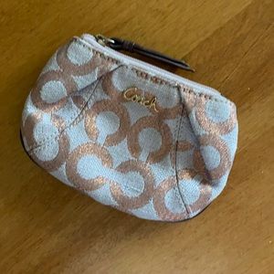 Rose gold Coach card holder with zipper